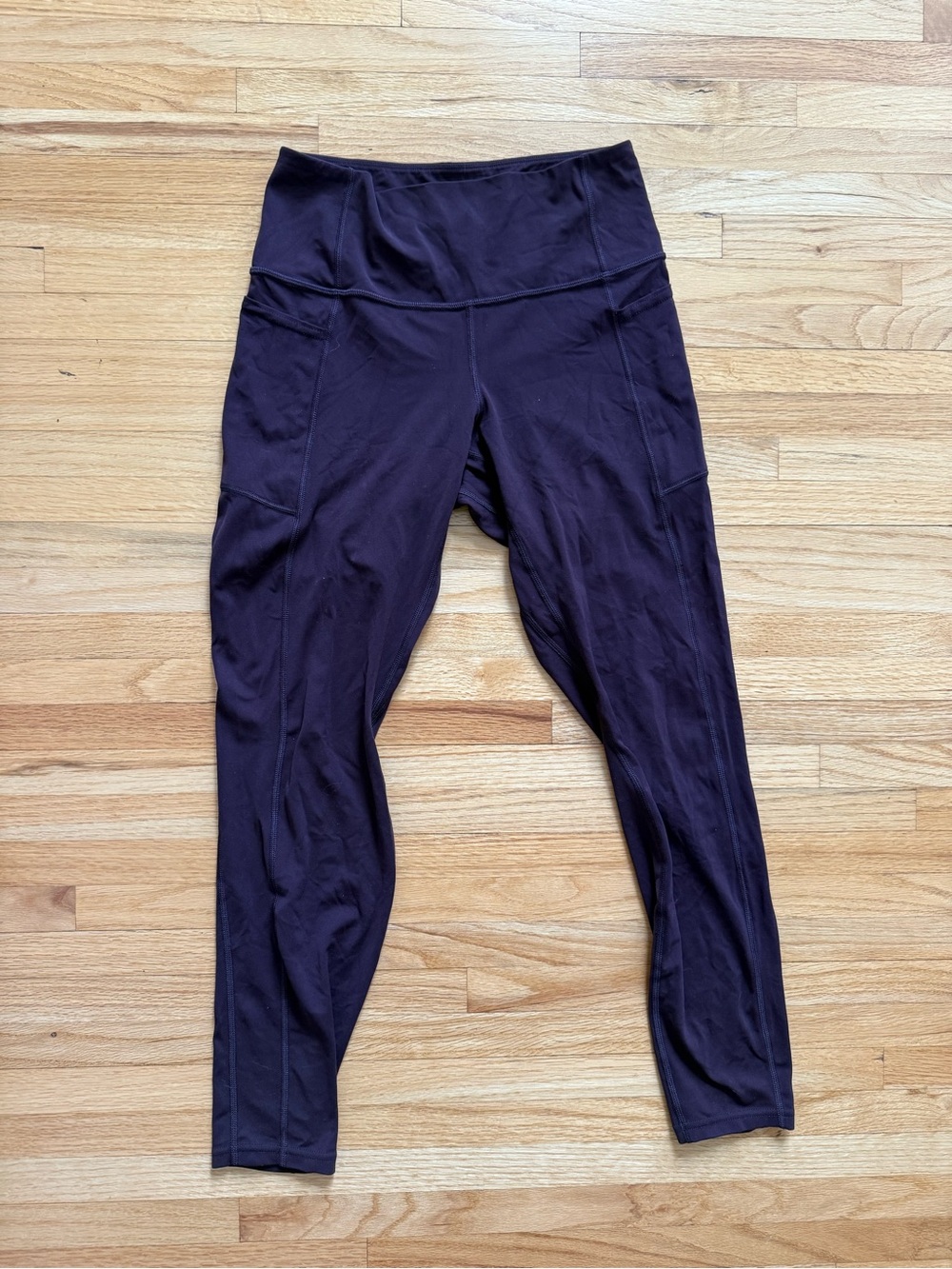 Patagonia Plum Leggings with side pockets - size women’s medium - like new